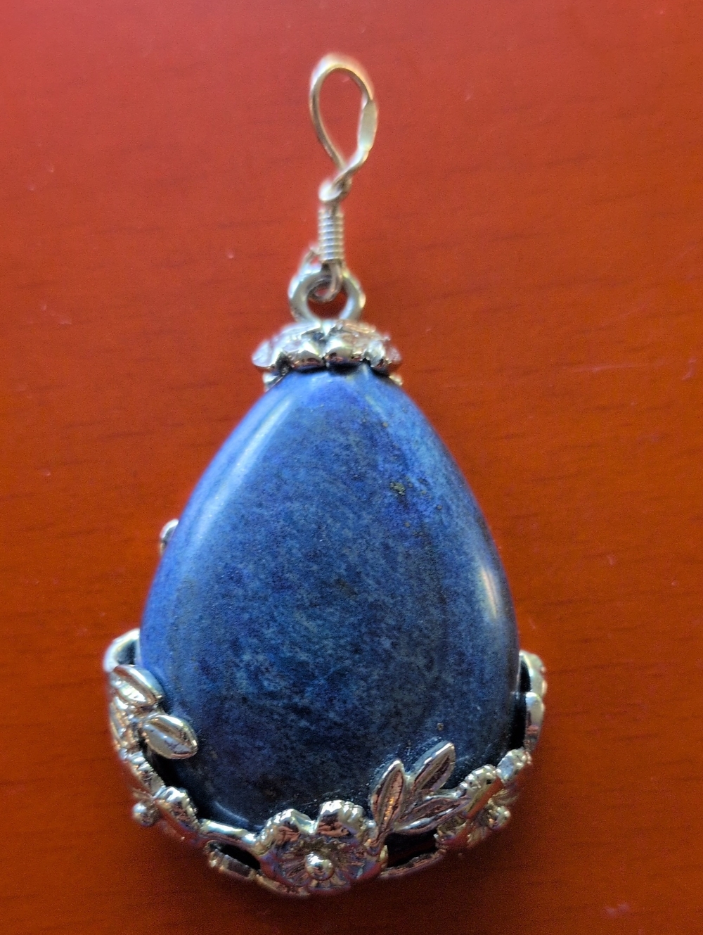 Sterling Silver Foral Motif Pendant with Lapis center